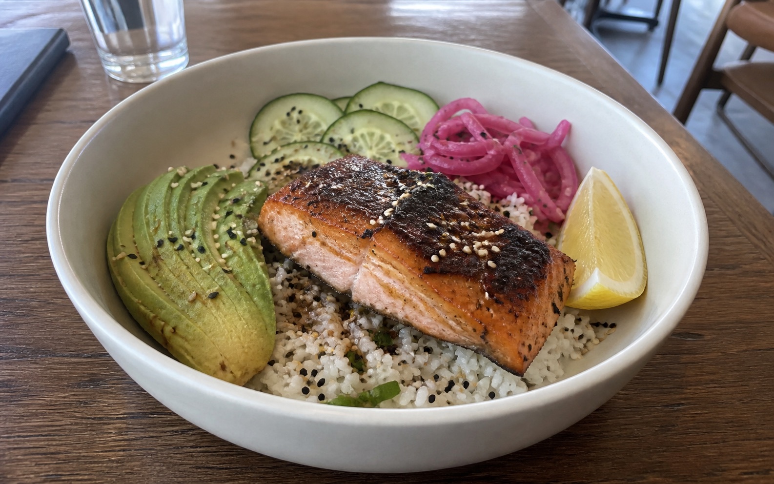 Comparison showing a casual salmon rice bowl photo versus a polished menu-ready edit of the same dish.