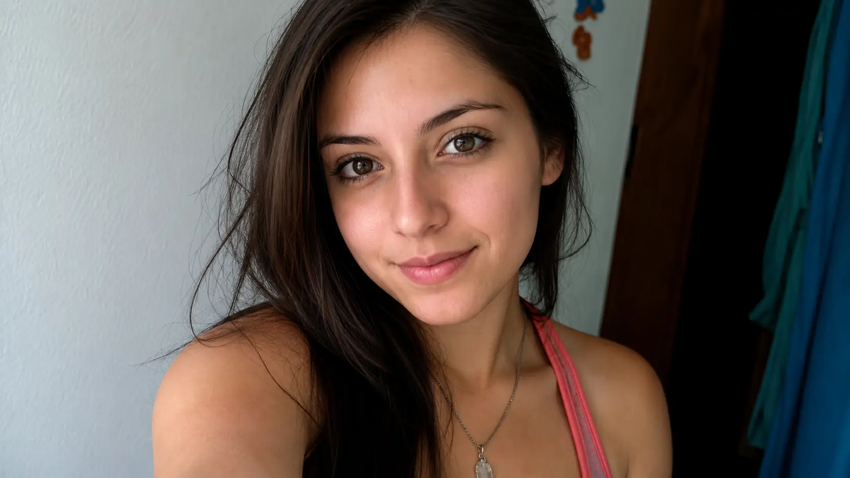 Before-and-after comparison of a pixelated portrait enlarged into a cleaner image. result
