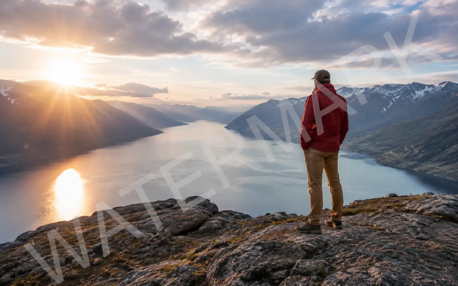 Before-and-after comparison of a diagonal watermark removed from a mountain lake travel photo.