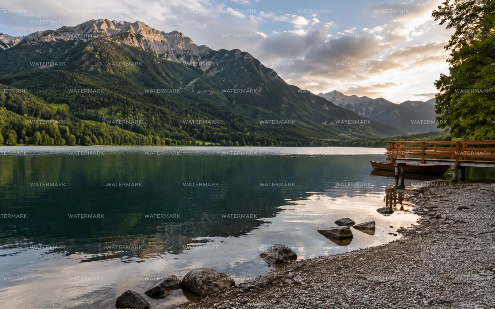 Before-and-after comparison of repeated watermark text removed from a mountain lake image.