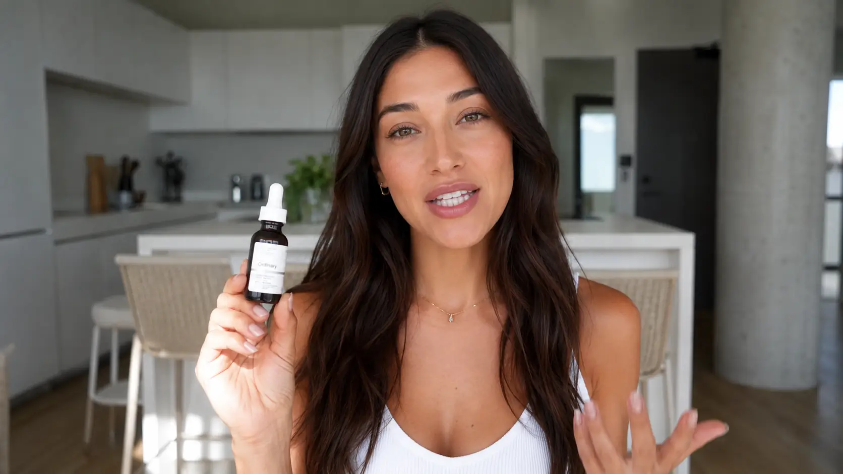 Creator speaking to camera while holding a product in a lip sync video example.