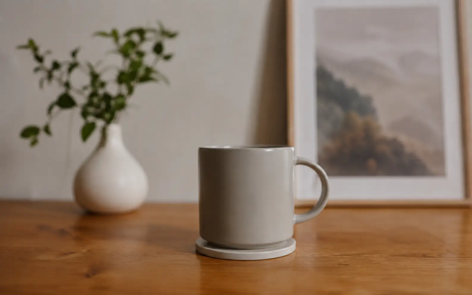 Before-and-after comparison of a soft mug photo restored for clearer rim, handle, and surface detail.
