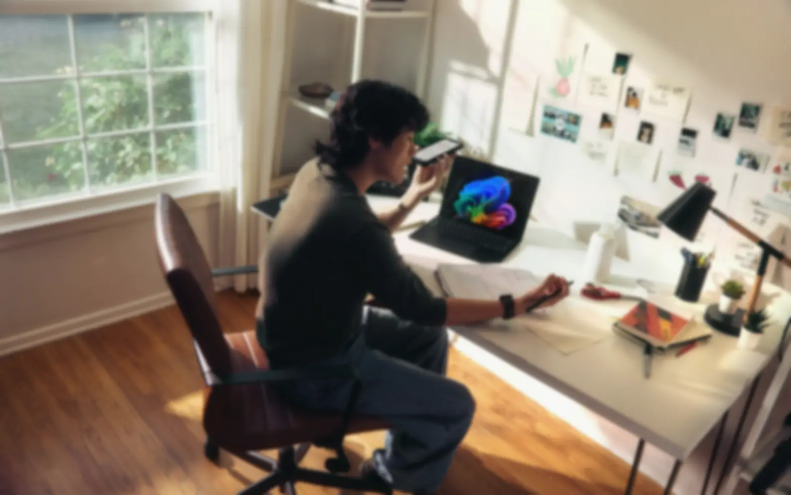 Before-and-after slider for a desk-side subject, showing improved foreground clarity after AI deblurring.