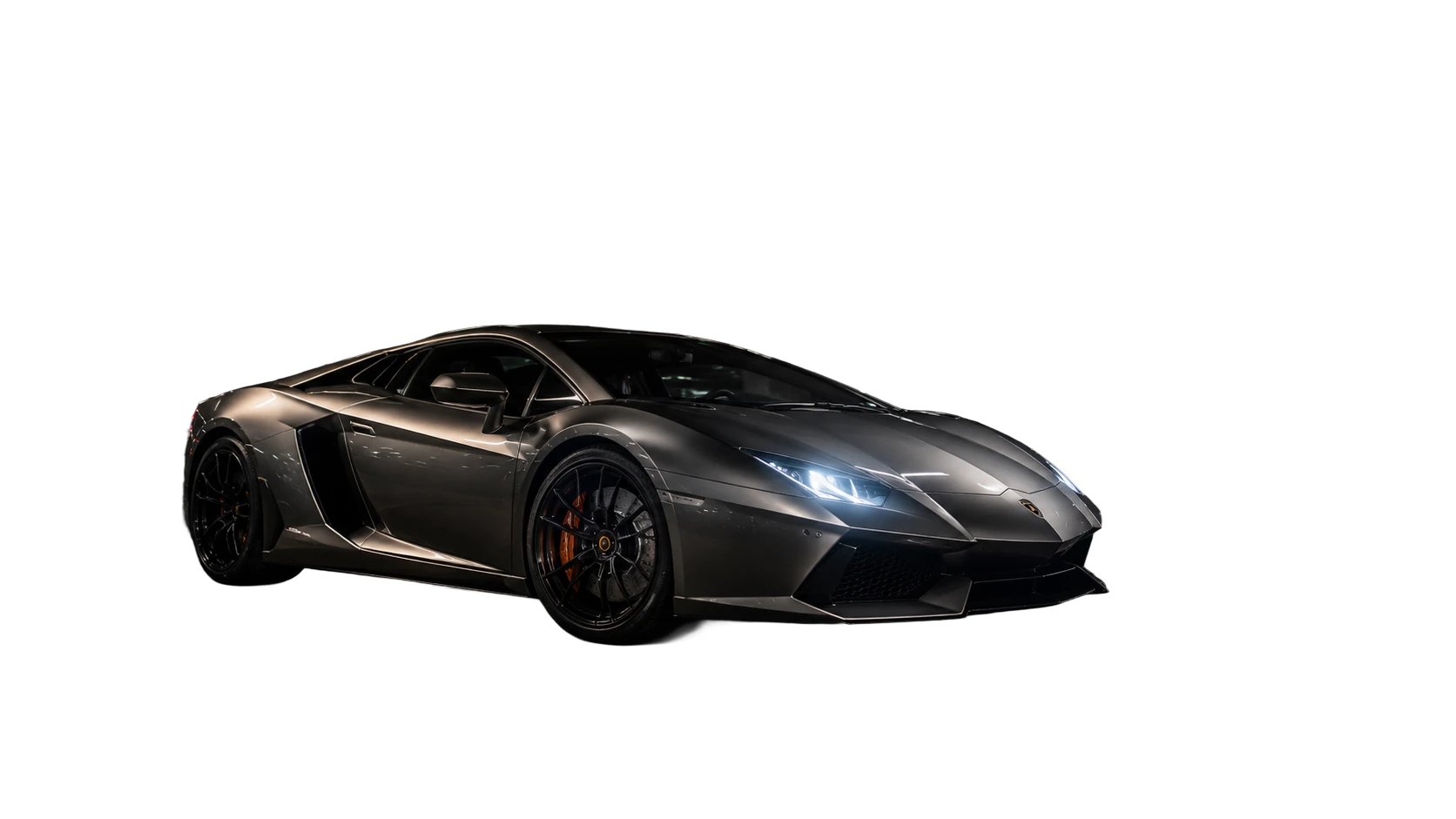 Before-and-after comparison of a sports car changed from a parking garage to a white background.